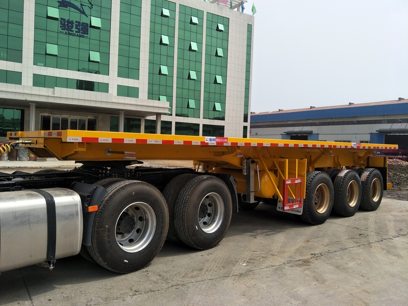 平板侧翻自卸式半挂车